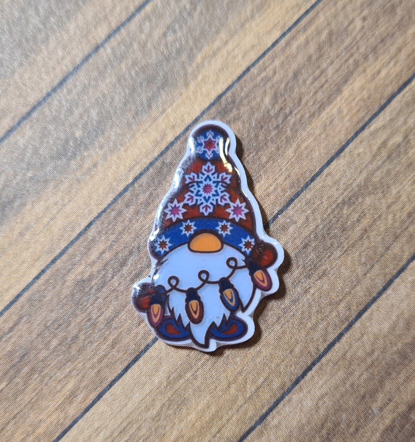 Cover Minder - Gnom mit Lichterkette