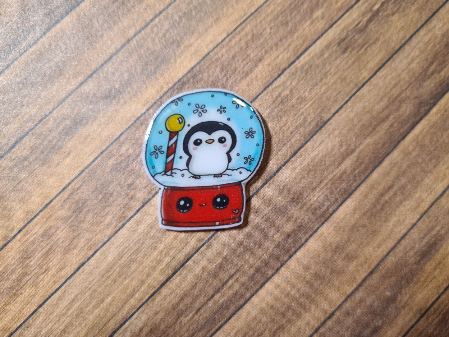 Cover Minder - Schneekugel Pinguin